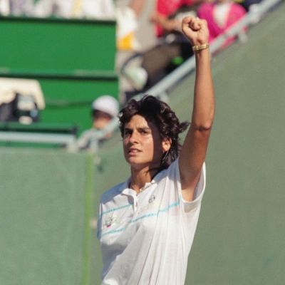 Gabriela Sabatini can be seen holding her left hand up with a fist sign.
